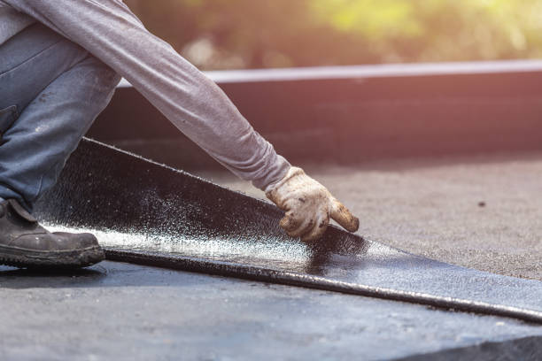 Professional Basement Waterproofing technician working in Houghton, MI